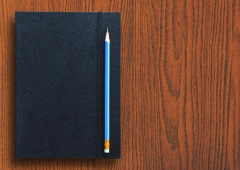 Pencil with notebook Stock Photos