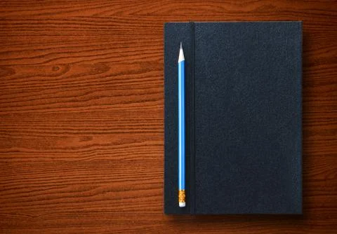 Pencil with notebook Stock Photos