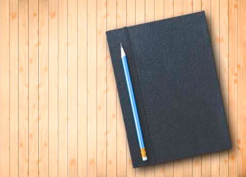 Pencil with notebook Stock Photos