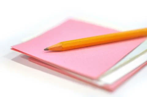 Pencil on the notepaper Stock Photos