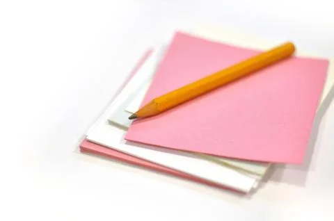 Pencil on the notepaper Stock Photos