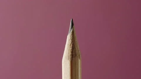 Pencil on a pink background Stock Footage 146817420