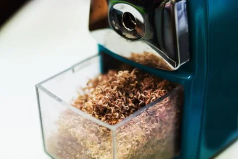 Pencil sharpener and shaving Stock Photos