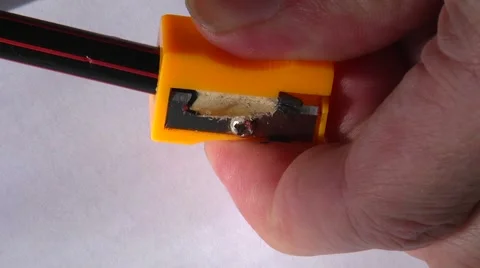 Pencil sharpener in male hands Stock Footage 60043767