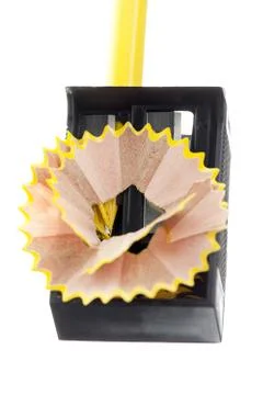 Pencil on a sharpener Stock Photos