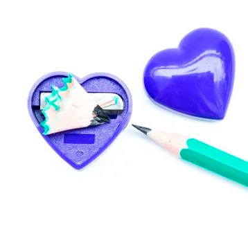 Pencil sharpener in the shape of heart Stock Photos
