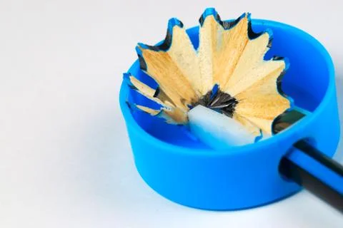 Pencil sharpener on the white paper. Back to school Stock Photos