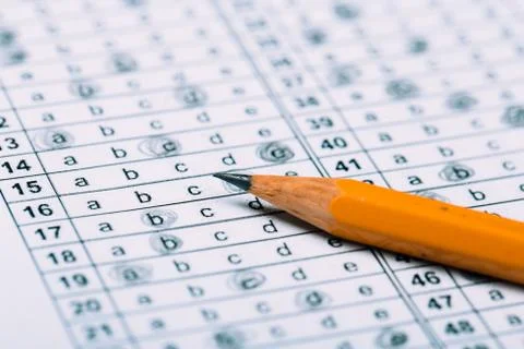 A pencil sitting on a test bubble sheet Stock Photos