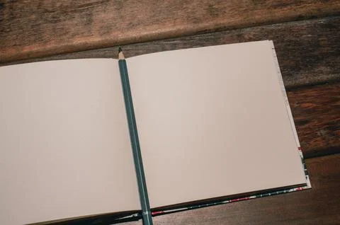 Pencil on small notepad blank for your text Stock Photos