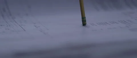 Pencil tapping on blueprints. Stockbeeldmateriaal 135462918