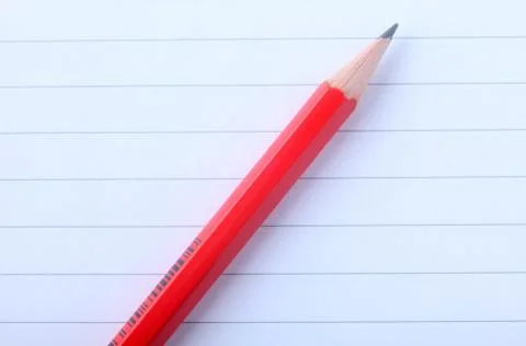 Pencil on white note book Stock Photos