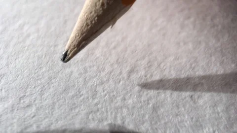 Pencil writes on paper Stock Footage 106003667
