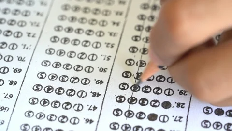 Pencil writing answer on paper answer of question in examination test. Stock Footage 104291450