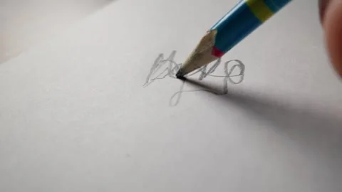 Pencil Writing Cursive Word You with Gray Graphite Tip on White Paper Stock Footage 339365883