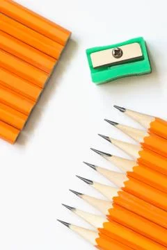 Pencils and sharpener Stock Photos