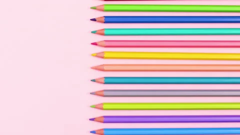 Pencils in different colors ordered on pastel pink theme. Stop motion Stock-Footage 147500448