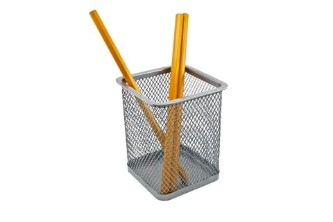 Pencils in empty containers of pencils Stock Photos