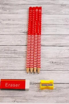 Pencils erasure and sharpener Stock Photos