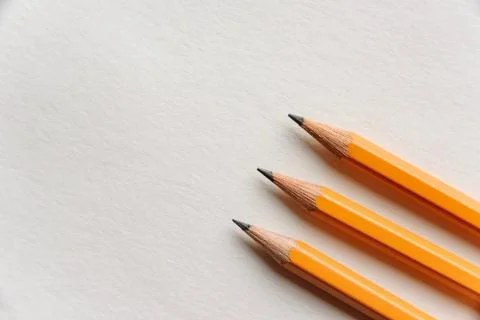 Pencils lie in parallel Stock Photos