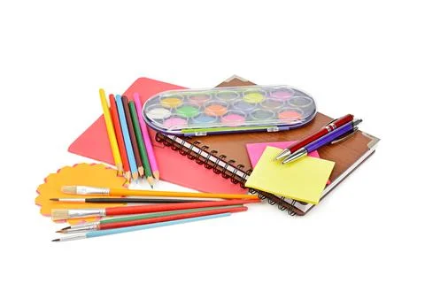 Pencils, paints, notebooks and other stationery isolated on a white backgroun Stock-Fotos