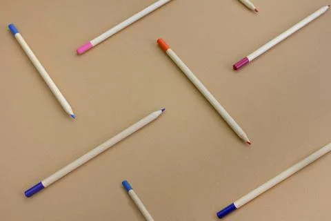 Pencils on a paper background, pattern Stock Photos