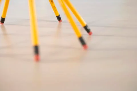 Pencils propped up in a pyramid shape Stock Photos