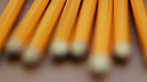 Pencils on Table Pull Focus Stock Footage 39377133