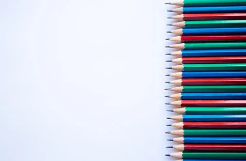 Pencils on white background with copy space, top fiew, flat lay Stock Photos
