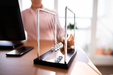 Pendulum Action Movement And Science Stock Photos