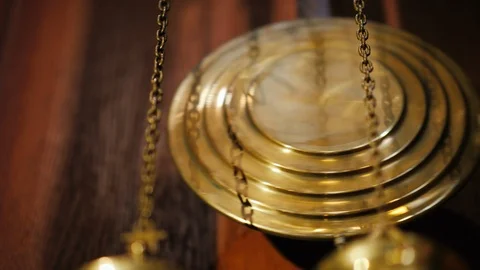 Pendulum of the ancient clock. Low angle shot Stock Footage 87789119