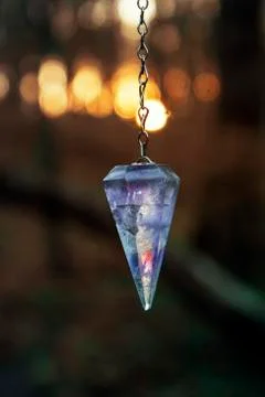 Pendulum chakra therapy Stock Photos