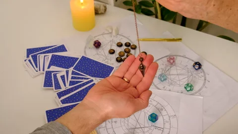 Pendulum fortune telling and astrology. Selective focus. Stock Footage 306058656
