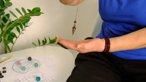 Pendulum fortune telling and astrology. Selective focus. Stock Footage 306058884