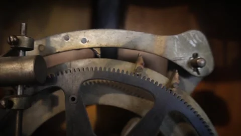 Pendulum Mechanism of an Old Wall Clock Stock Footage 254517231