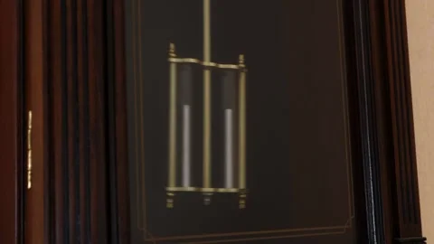 Pendulum of modern wall clock swings Stock Footage 244733172