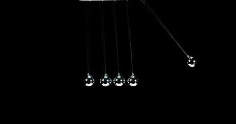 Pendulum, Newton's Cradle, One Ball hits Another against Black Background, Sl Video stock 106355815
