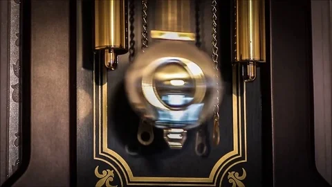 The pendulum of the old clock Stock Footage