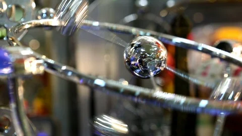 Pendulum. A system that is suspended in a gravitational field and performs me Video stock 89757183