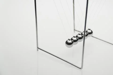 Pendulum on a white background Stock Photos