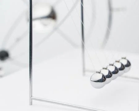 Pendulum on a white background Stock Photos