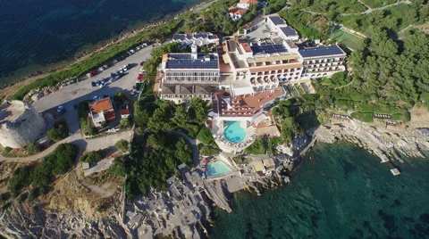 Peninsula with lighthouse from drone Stockbeeldmateriaal 59832289