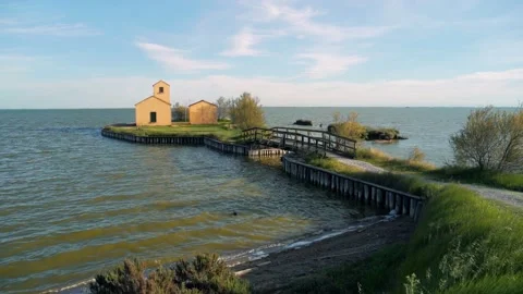 Peninsula with an old building in the middle of the Comacchio lagoon. Stock Footage 213639088