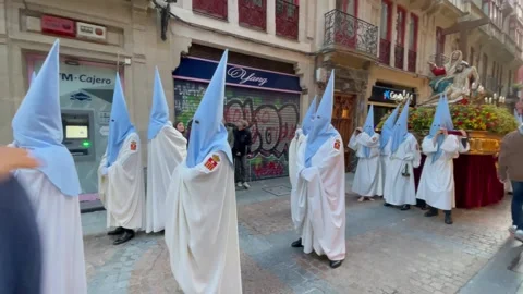 Penitents Carrying Religious Float During Semana Santa in Bilbao Stock Footage 332276291