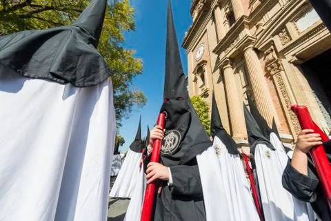 Penitents in procession. Stock Photos
