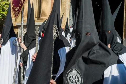 Penitents in procession. Stock Photos
