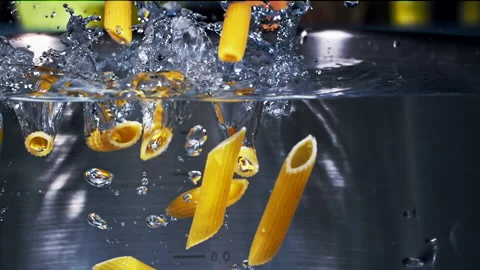 Penne Pasta Falling Down in to the pot Super Slow motion 1000fps Stock Footage 130914783