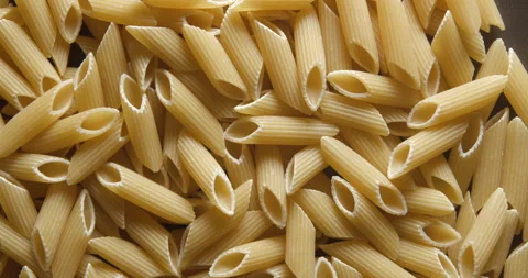 Penne pastas close up studio shot over rotating Stock-Footage 324840209