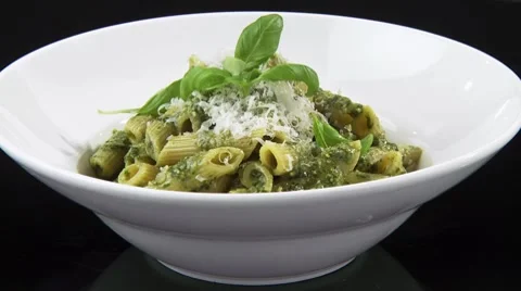 Penne with pesto Stock Footage 8571527