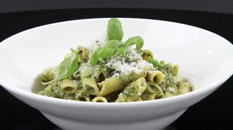 Penne with pesto Stock Footage 8571528