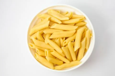 Penne into the pot Stock Photos